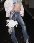 Rase le sol Distressed Low-Rise Washed Flared Denim Jeans