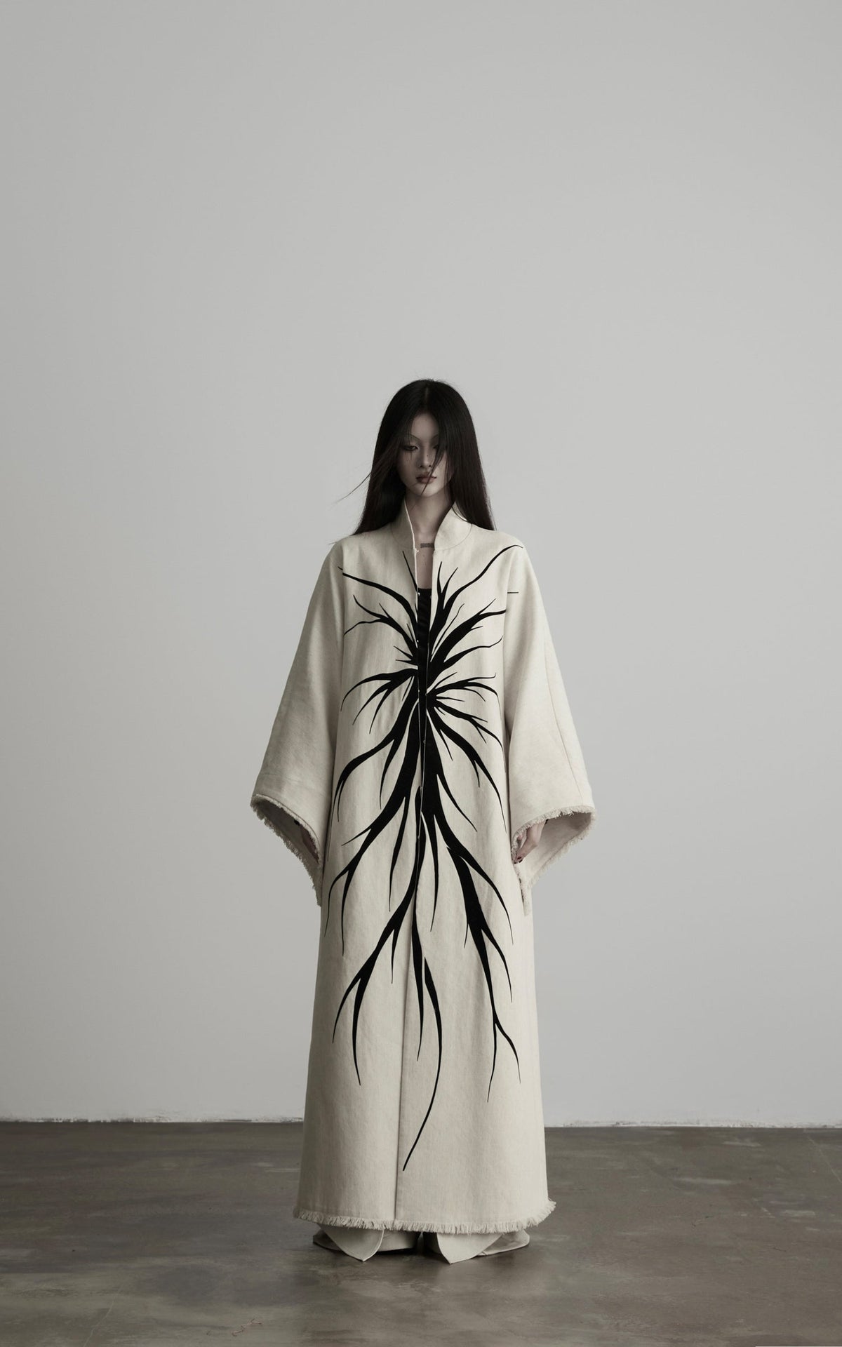 DOINDULGE Avant-Garde Raw Hem Long Coat
