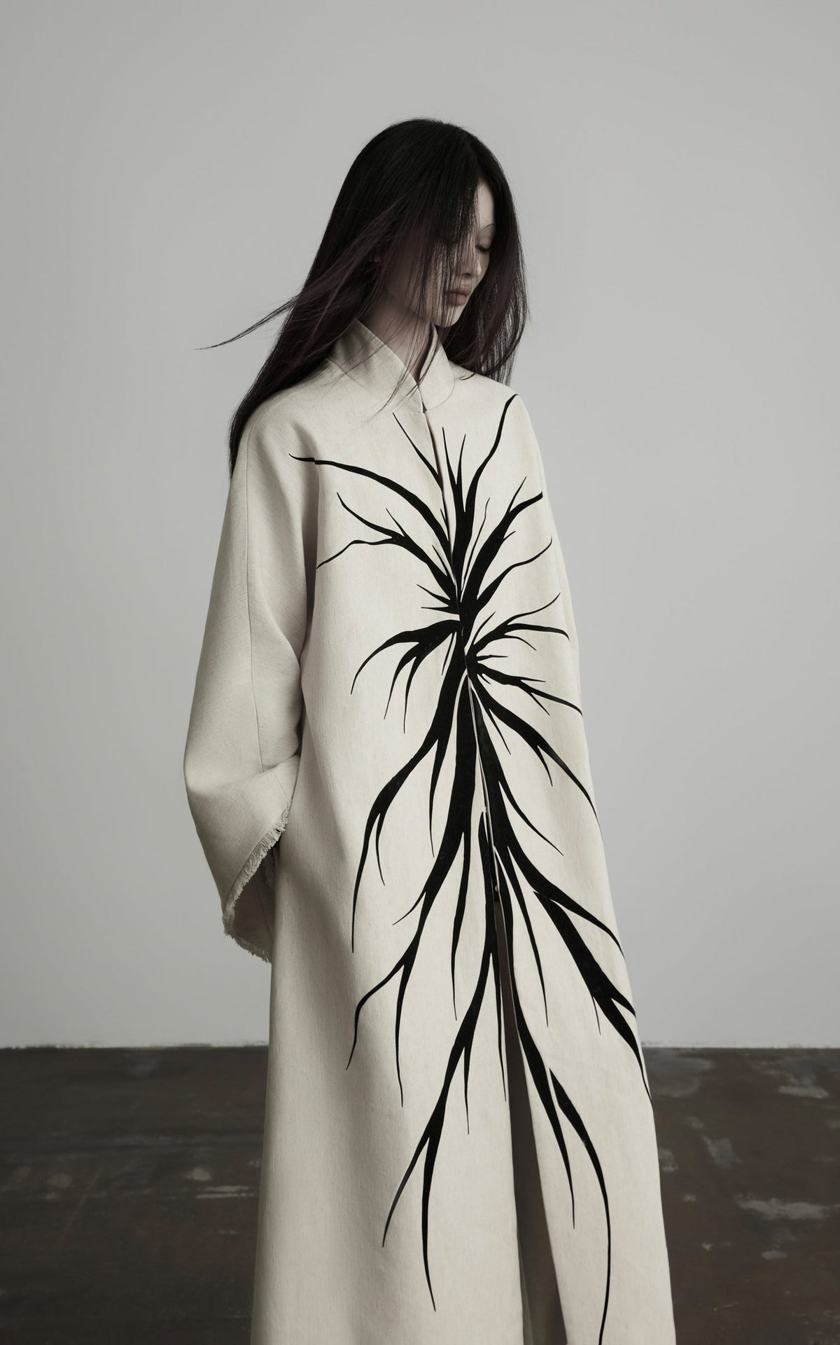 DOINDULGE Avant-Garde Raw Hem Long Coat