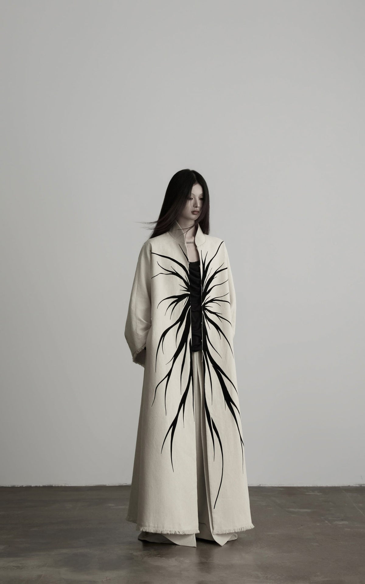 DOINDULGE Avant-Garde Raw Hem Long Coat