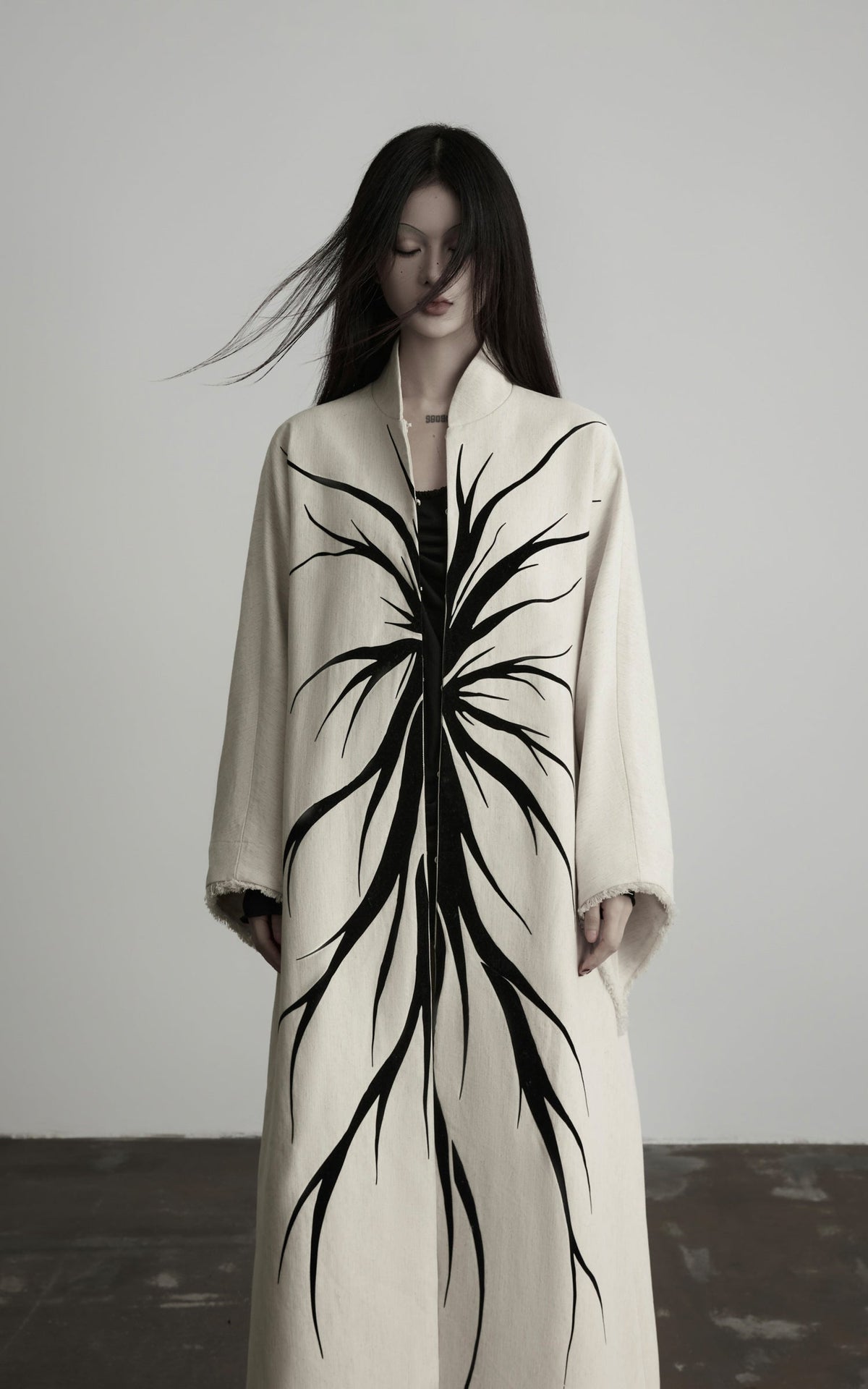DOINDULGE Avant-Garde Raw Hem Long Coat