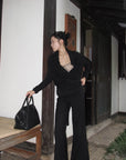 Hydrae Low-Rise Statement Buckle Belt Flared Pants
