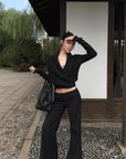 Hydrae Low-Rise Statement Buckle Belt Flared Pants
