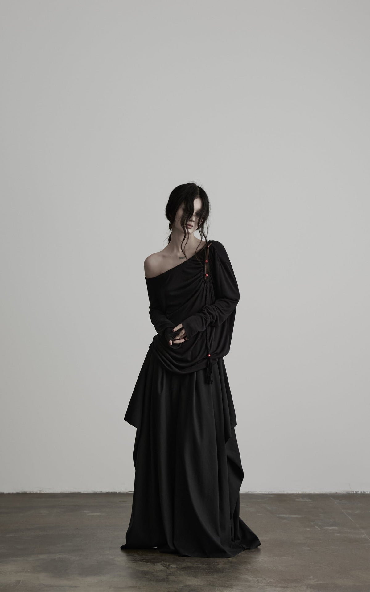 DOINDULGE Irregular Neckline Knit Long Sleeve Top