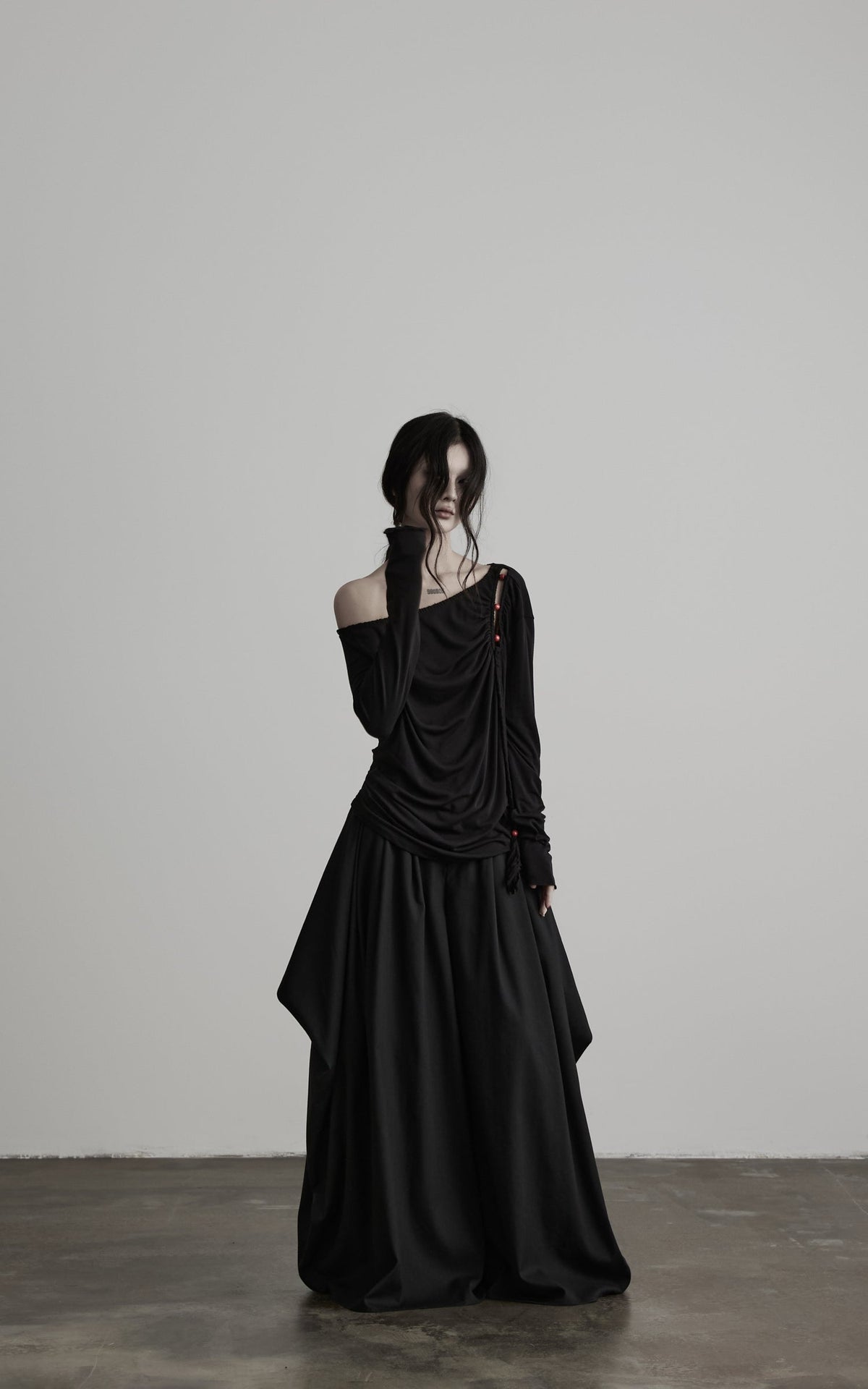 DOINDULGE Irregular Neckline Knit Long Sleeve Top