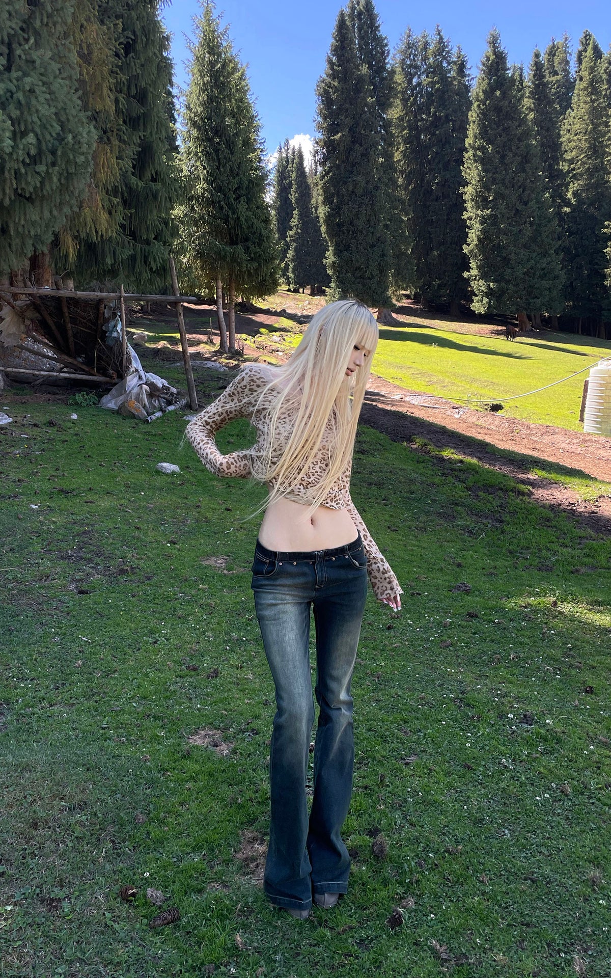 Rase le sol Faded Flared Denim Pants with Copper-Tone Rivets &amp; Embroidered Back Pockets