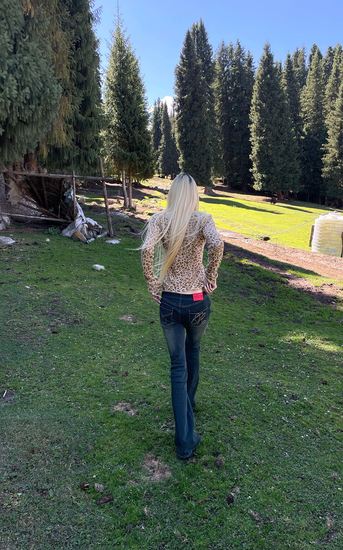 Rase le sol Faded Flared Denim Pants with Copper-Tone Rivets &amp; Embroidered Back Pockets