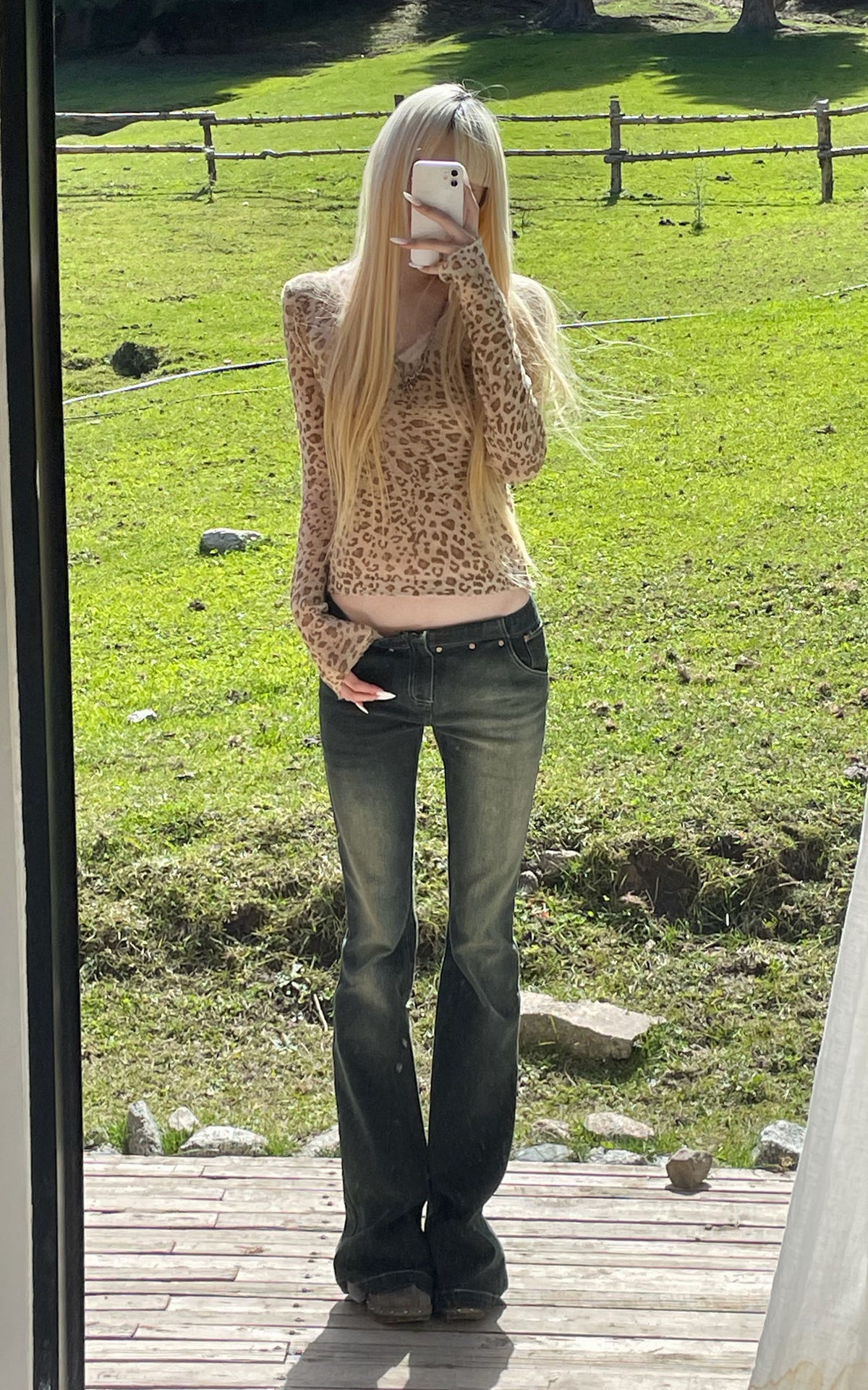 Rase le sol Faded Flared Denim Pants with Copper-Tone Rivets &amp; Embroidered Back Pockets