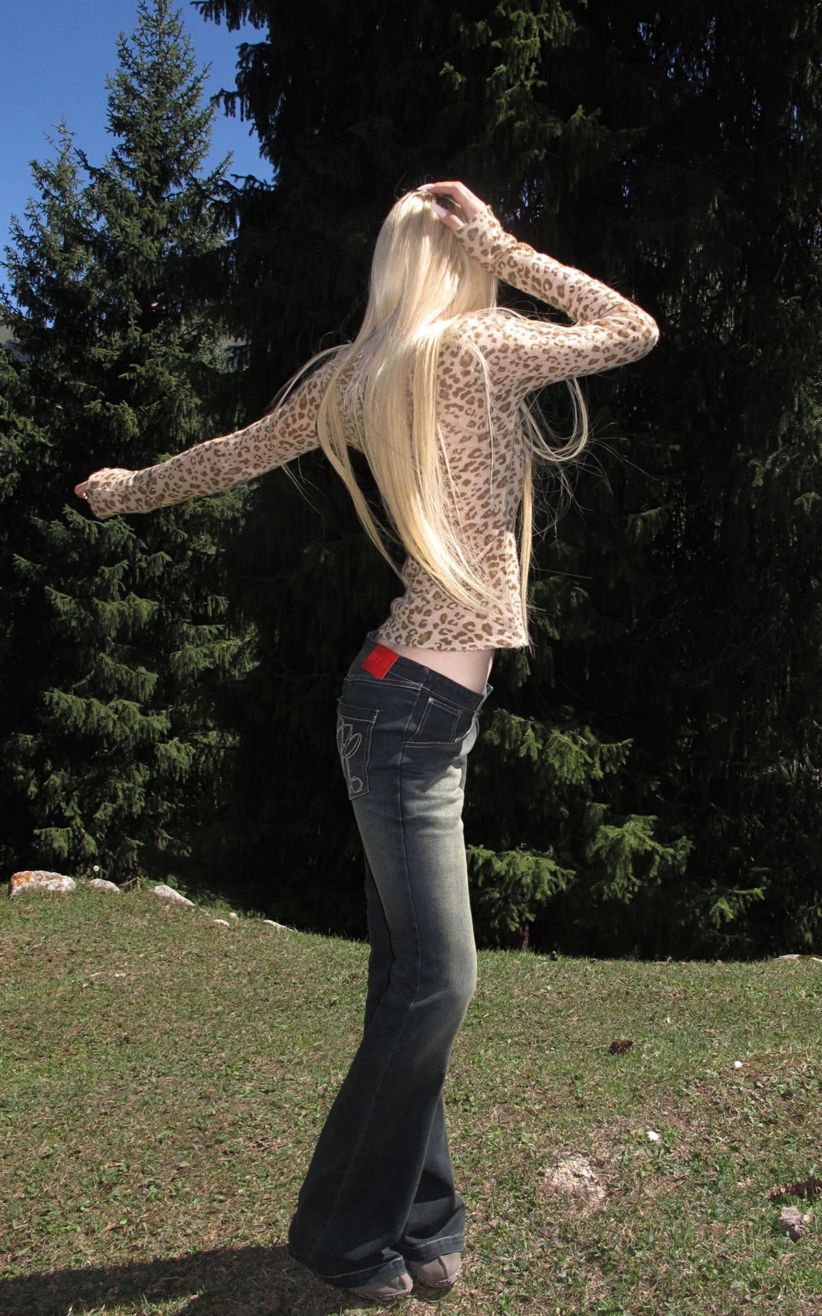 Rase le sol Faded Flared Denim Pants with Copper-Tone Rivets &amp; Embroidered Back Pockets