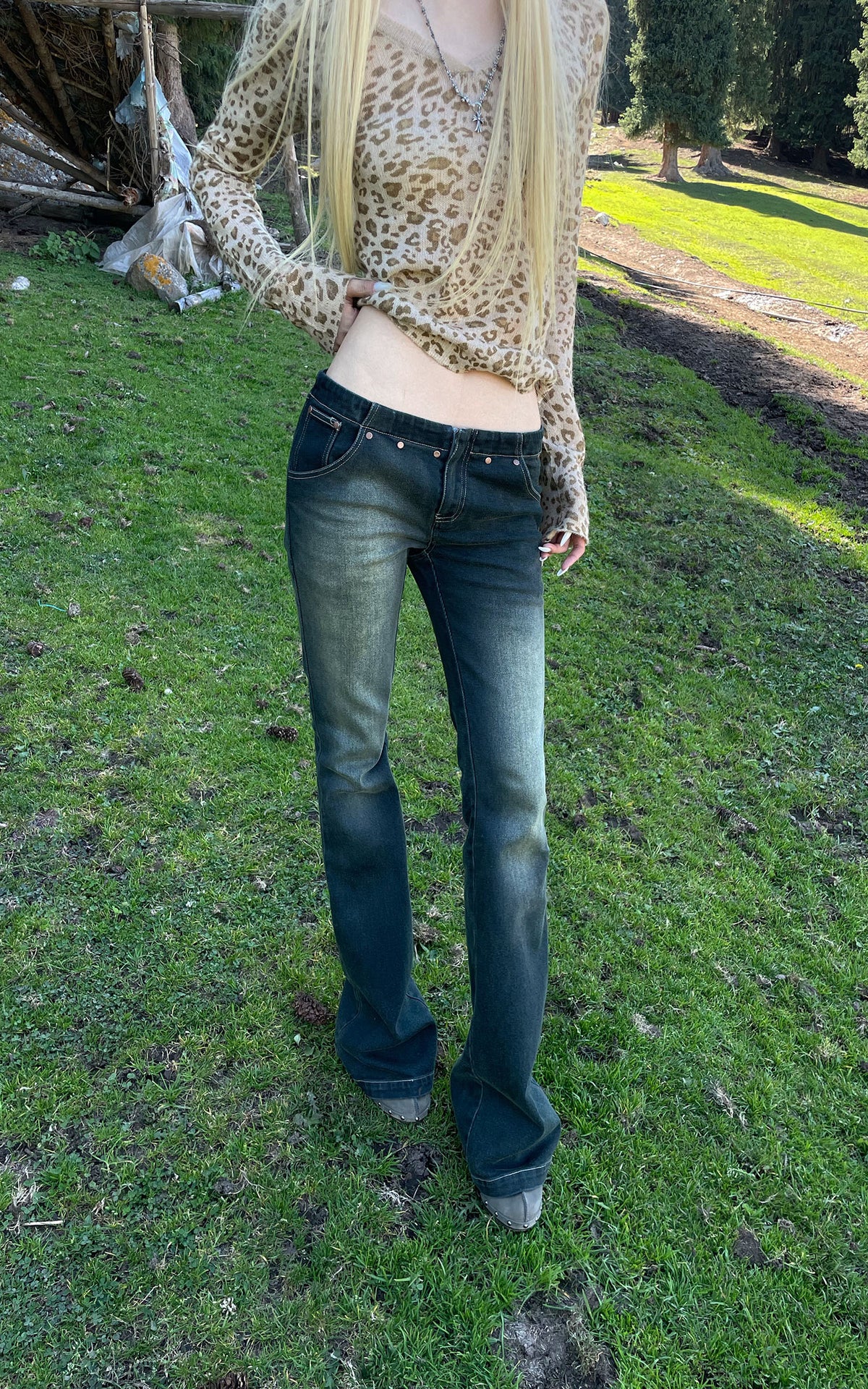Rase le sol Faded Flared Denim Pants with Copper-Tone Rivets &amp; Embroidered Back Pockets