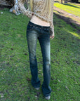 Rase le sol Faded Flared Denim Pants with Copper-Tone Rivets & Embroidered Back Pockets