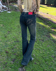 Rase le sol Faded Flared Denim Pants with Copper-Tone Rivets & Embroidered Back Pockets