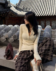 Hydrae Fitted Half-Zip Knit Top with Thumbholes