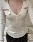 Rase le sol Lace-Trimmed Deep V-Neck Fitted Long Sleeve Top