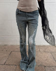 Rase le sol Distressed Low-Rise Flared Denim Pants
