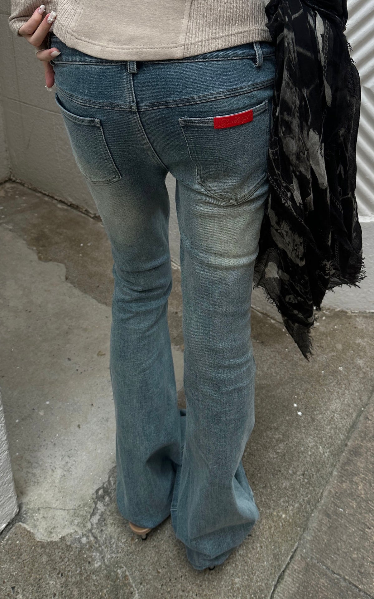 Rase le sol Distressed Low-Rise Flared Denim Pants
