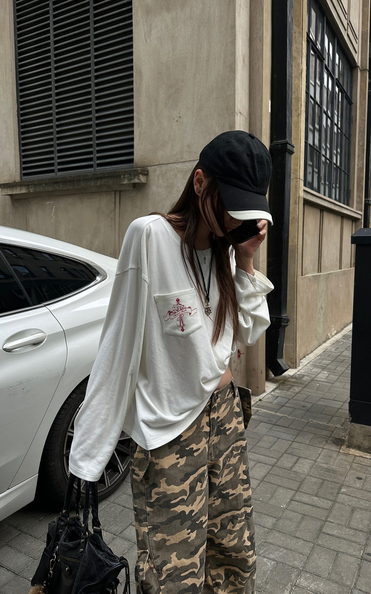 Rase le sol Amor Fati Cross-Embroidered Asymmetric Draped Long Sleeve Top