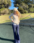 Rase le sol Sculpted V-Neck Cable Knit Top