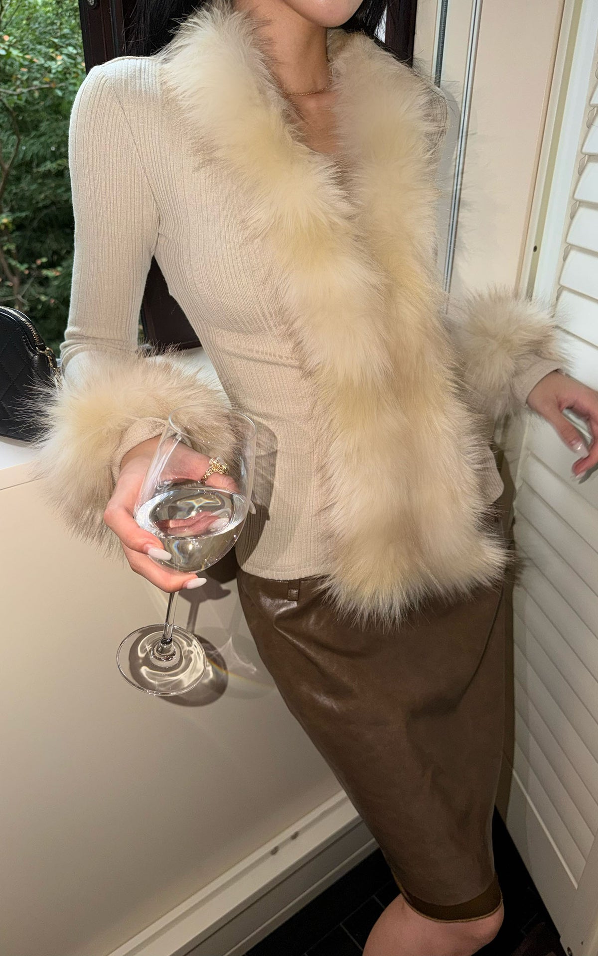 Hydrae Haut cardigan ajusté en maille côtelée avec garniture en peluche