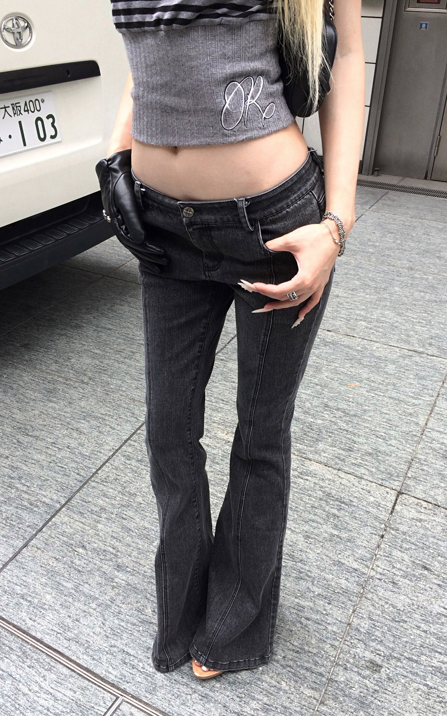 Rase le sol Dark Washed Flare Denim Pants with Slim Fit and Extended Bell Bottom Silhouette