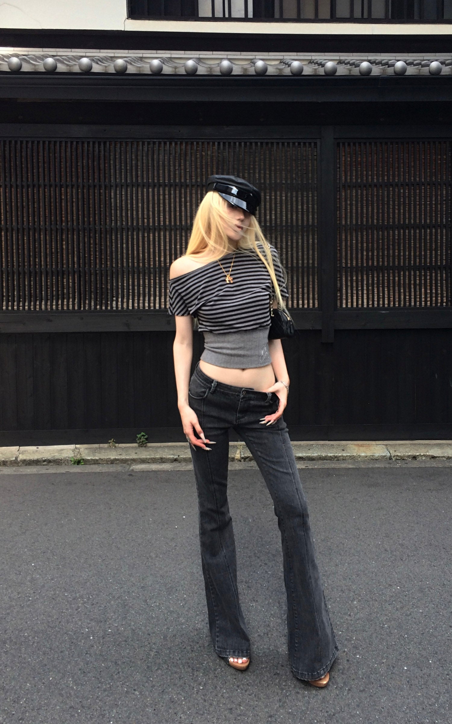 Rase le sol Dark Washed Flare Denim Pants with Slim Fit and Extended Bell Bottom Silhouette