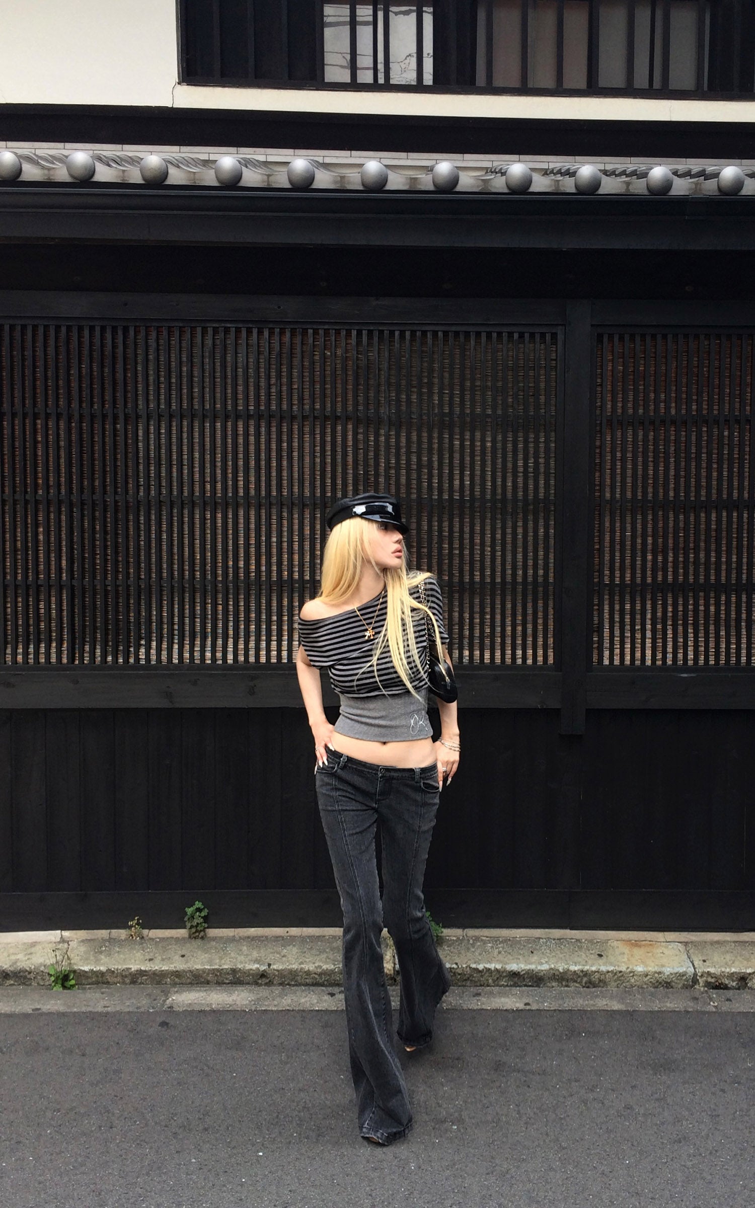 Rase le sol Dark Washed Flare Denim Pants with Slim Fit and Extended Bell Bottom Silhouette