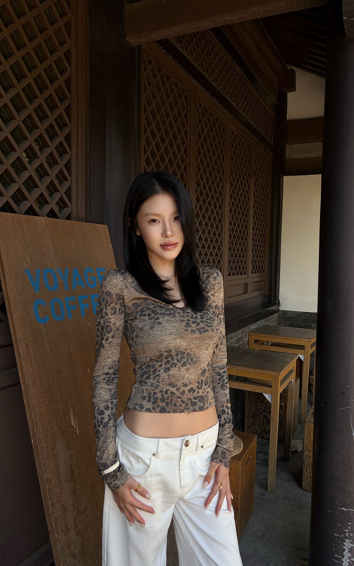 Hydrae Leopard Print Long Sleeve Top With Fitted Silhouette And Lace Trim Details