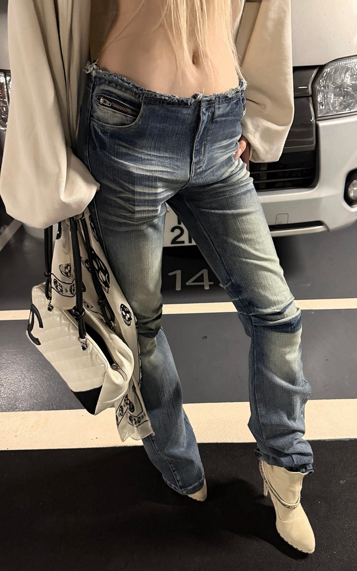 Rase le sol Distressed Low-Rise Washed Flared Denim Jeans