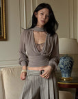 Hydrae Draped Wrap Front Ruched Long Sleeve Top With Asymmetric Neckline