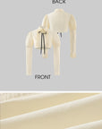 Rase le sol Cropped Puff-Sleeve Shirt with Pleated Front and Rosette Tie