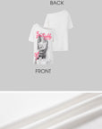 IAMXIAA T-shirt oversize blanc à épaules dénudées avec imprimé graphique