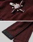 DOINDULGE Asymmetric Cutout Bodysuit with Ceramic Cross Embellishment