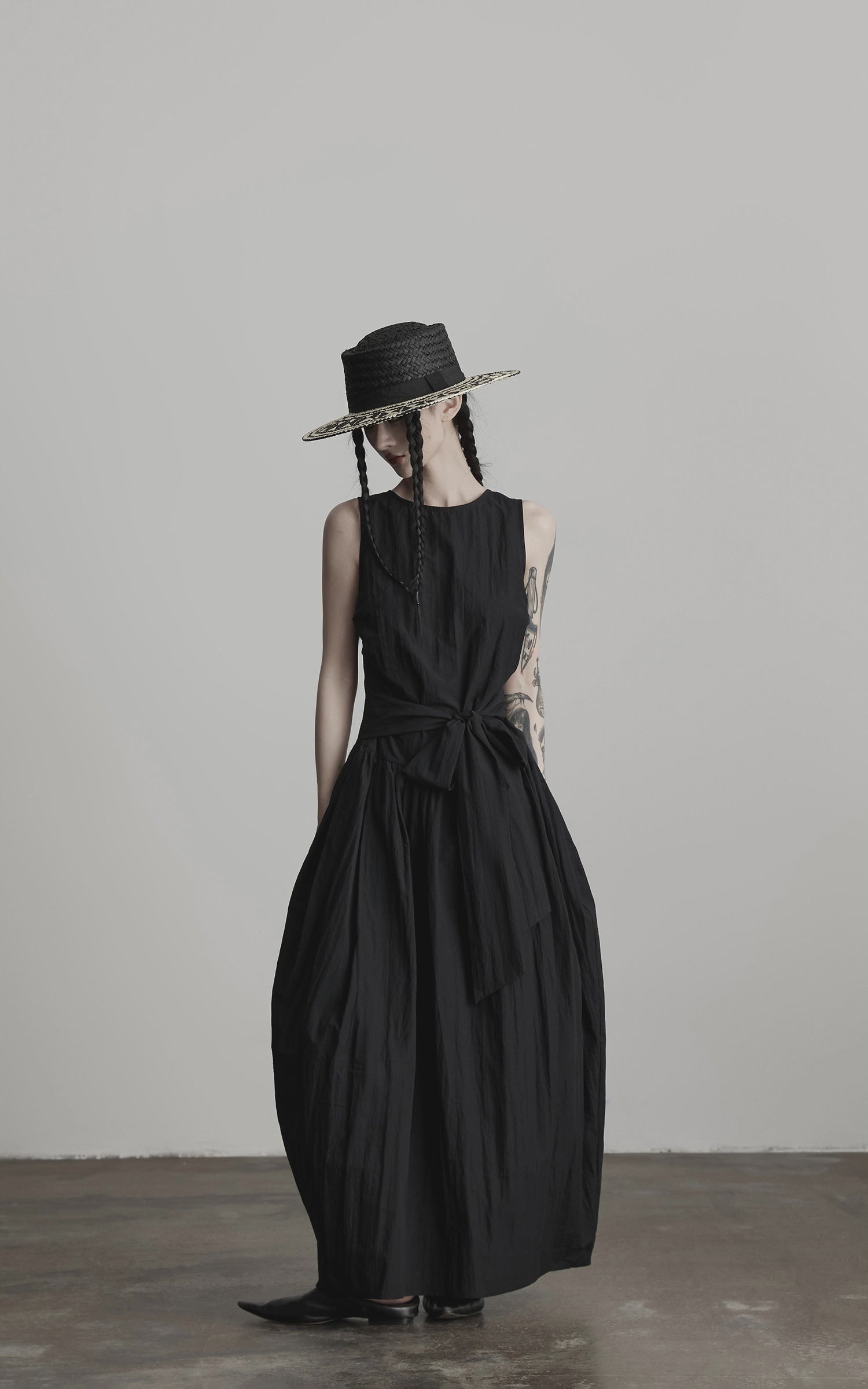 DOINDULGE Sleeveless Draped Maxi Dress with Hand-Tied Bead Embellishment and Sculpted Waist