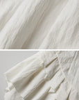 DOINDULGE Asymmetric Ruched High-Neck Shirt with Sculptural Draped Panels