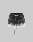 WARDEN EDGE Mini à carreaux avec bordure en dentelle Short doté d'une taille élastique et d'une silhouette streetwear décontractée