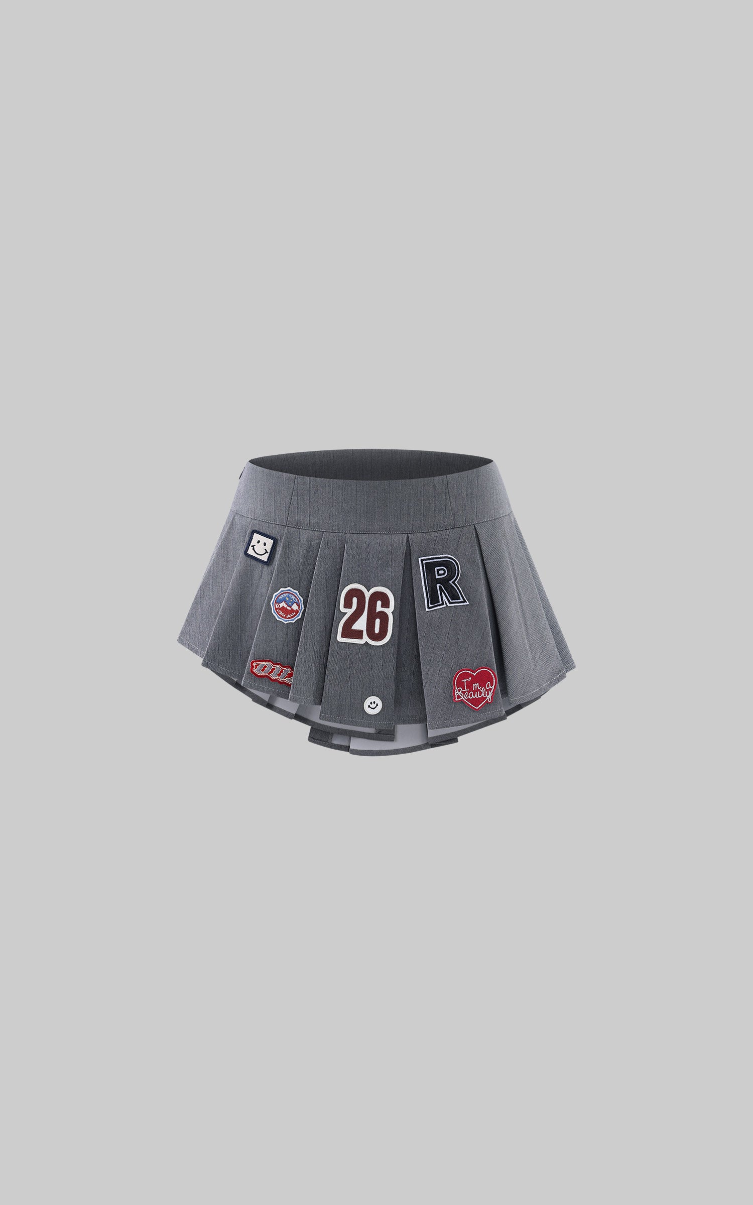 WARDEN EDGE Varsity Patch Pleated Micro Skirt