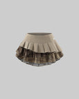 WARDEN EDGE Layered Pleated Mini Skirt with Plaid Contrast Panels