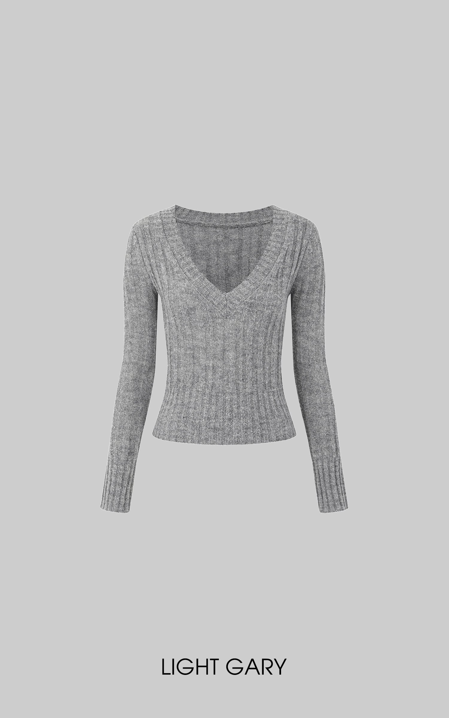 Haut en maille côtelée à col en V ajusté