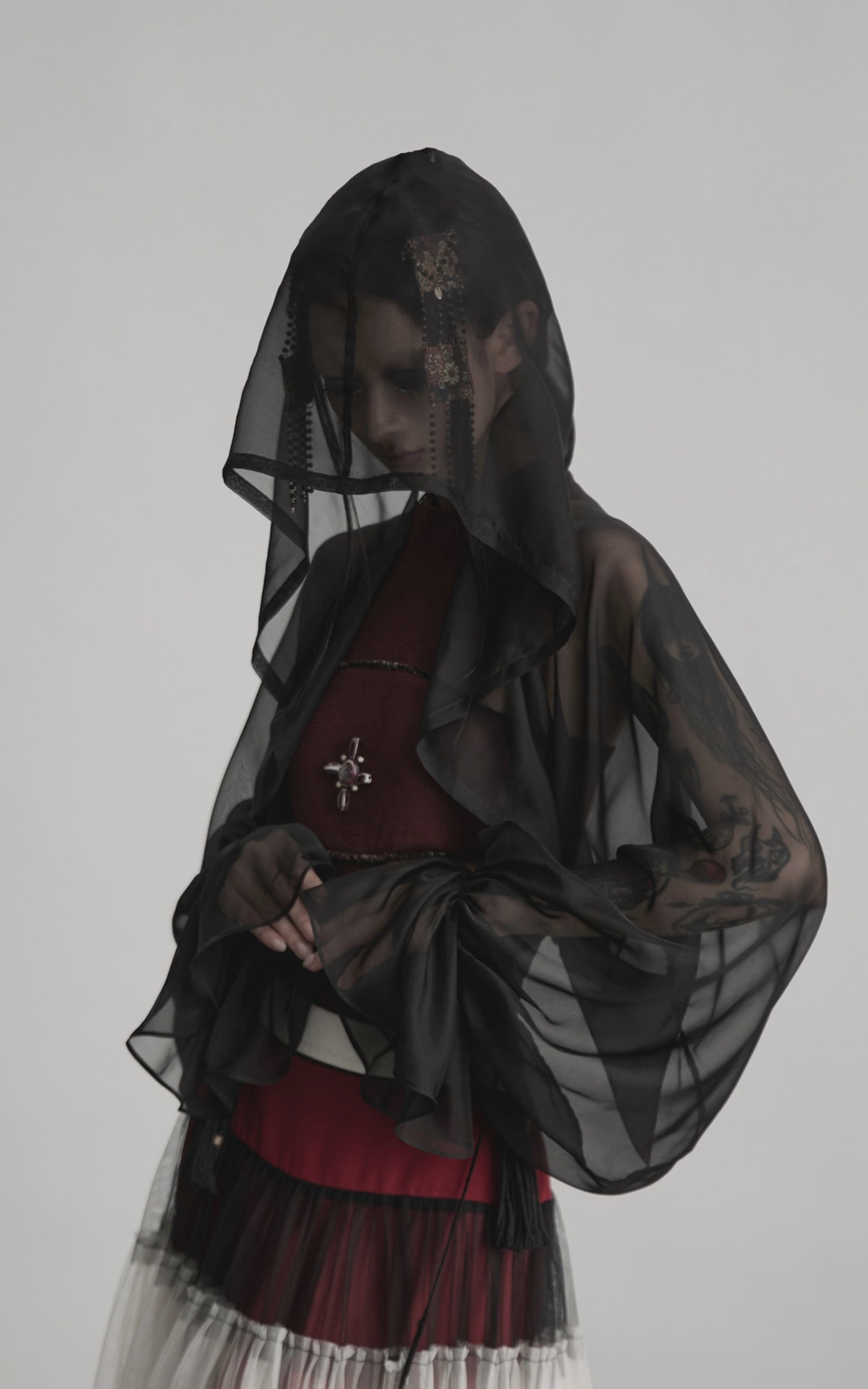 DOINDULGE Draped Mesh Hooded Cardigan with Tassel Accents and Voluminous Sleeves