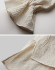 DOINDULGE Textured Gathered Sleeve Blouse