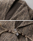 DOINDULGE Textured Wool Vest with Asymmetric Panels and Hand-Tied Toggle Details