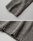 DOINDULGE Textured Asymmetric Collar Knit Sweater