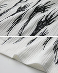 DOINDULGE Half Mock Neck Embroidered Ribbed Knit Top