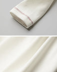 DOINDULGE Asymmetric Ruffled High-Neck Fitted Shirt