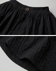 DOINDULGE Asymmetric Textured Wide-Leg Palazzo Pants