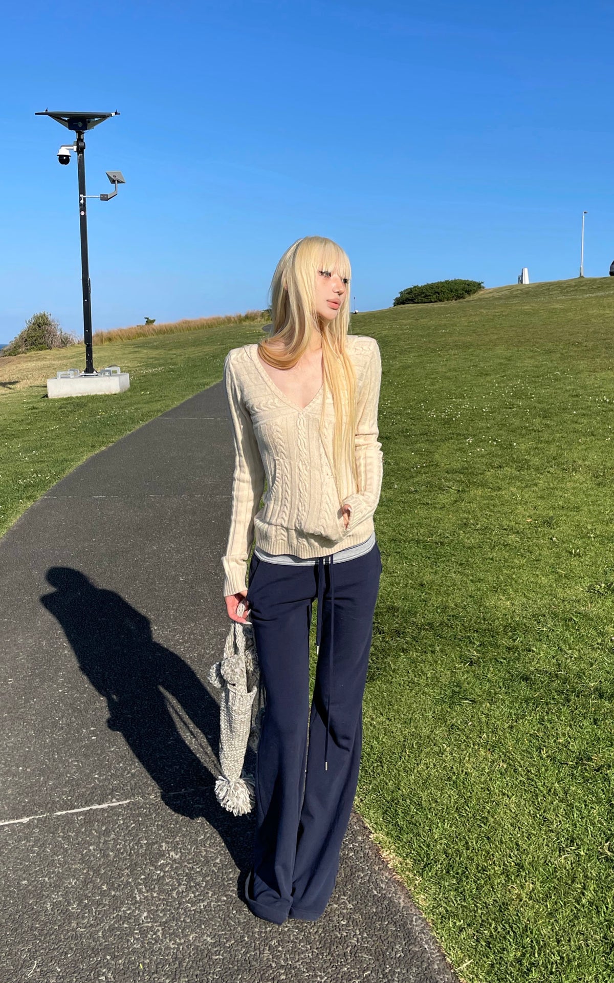 Rase le sol Sculpted V-Neck Cable Knit Top