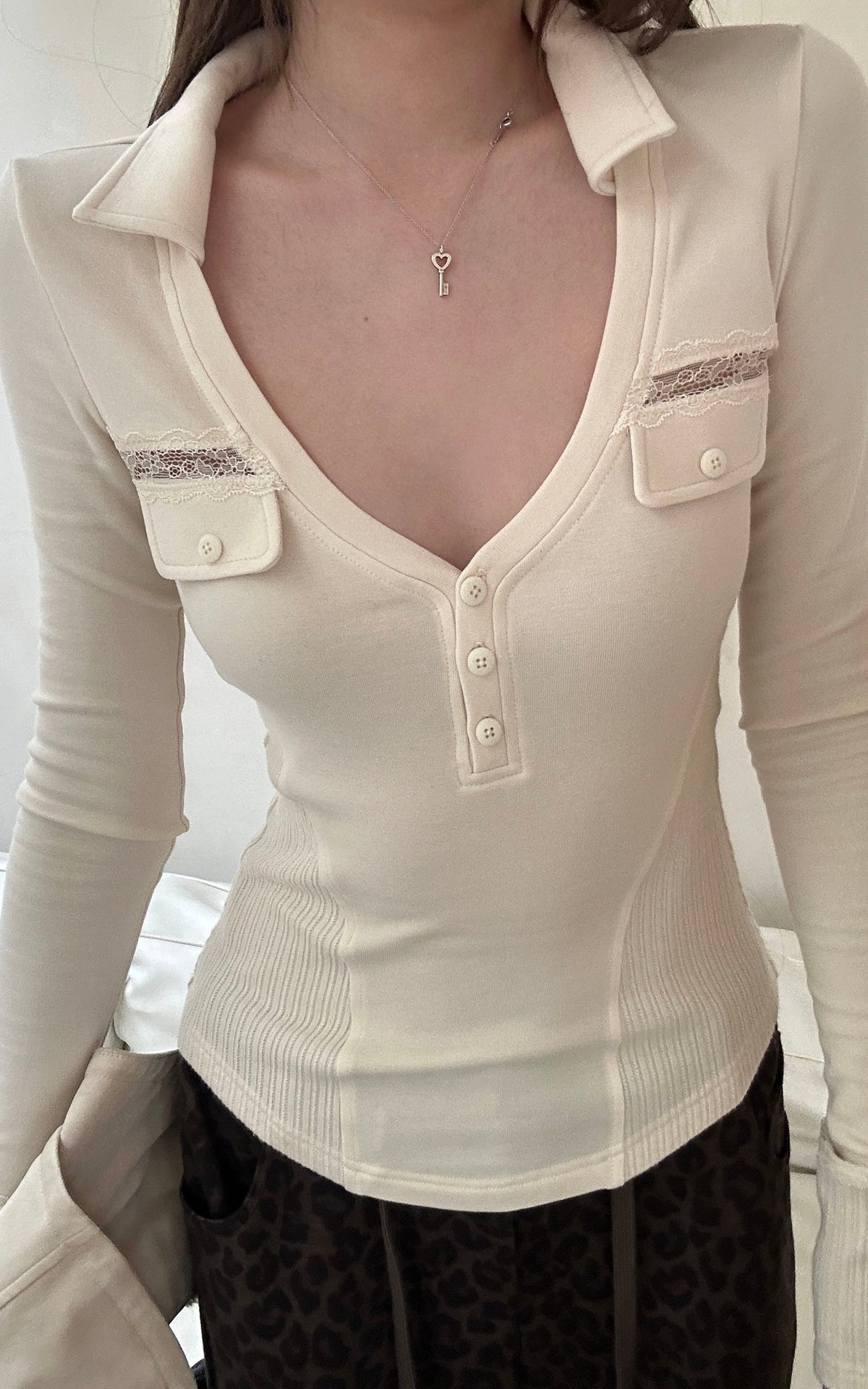 Rase le sol Lace-Trimmed Deep V-Neck Fitted Long Sleeve Top