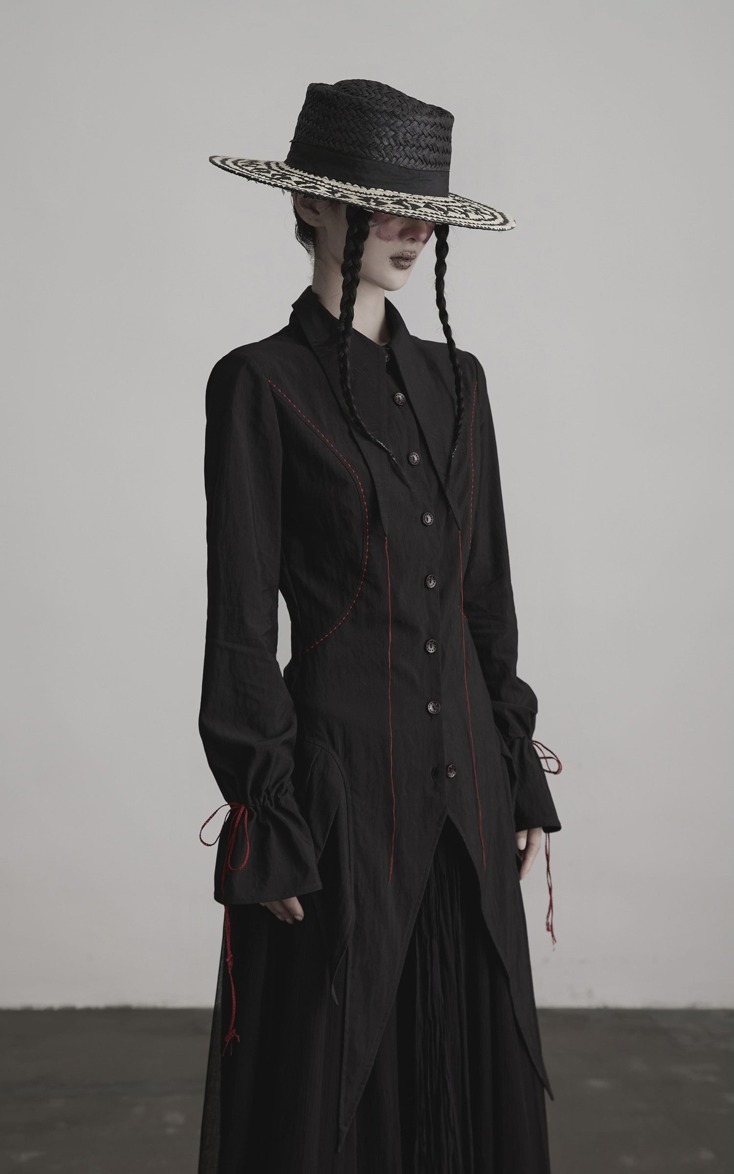 DOINDULGE Asymmetric Hem Shirt with Red Stitch Detail