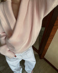 0122stepll Pull en maille à devant croisé drapé