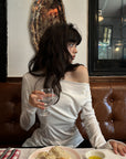 WARDEN EDGE Draped Off-Shoulder Ruched Long Sleeve Top